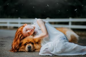 The Big Four Neurochemicals for Brain Health 2 girl and dog sleeping on gray pavement